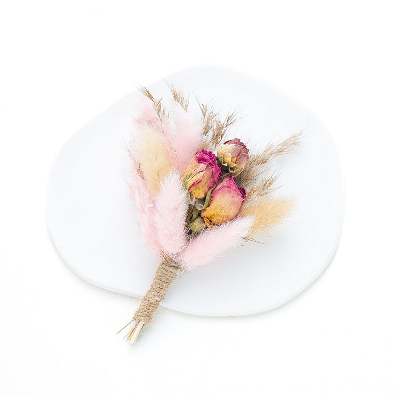 pastel pink bunny tail buttonhole