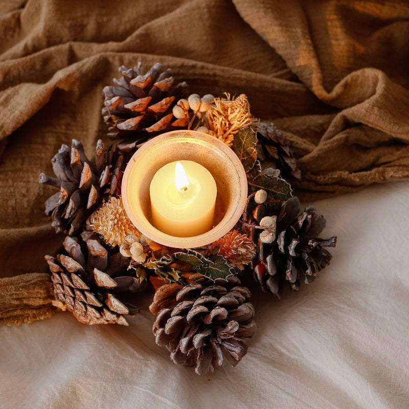 Pine cone candle holder