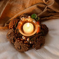 Pine cone candle holder