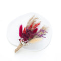 dark red bunny tail buttonhole