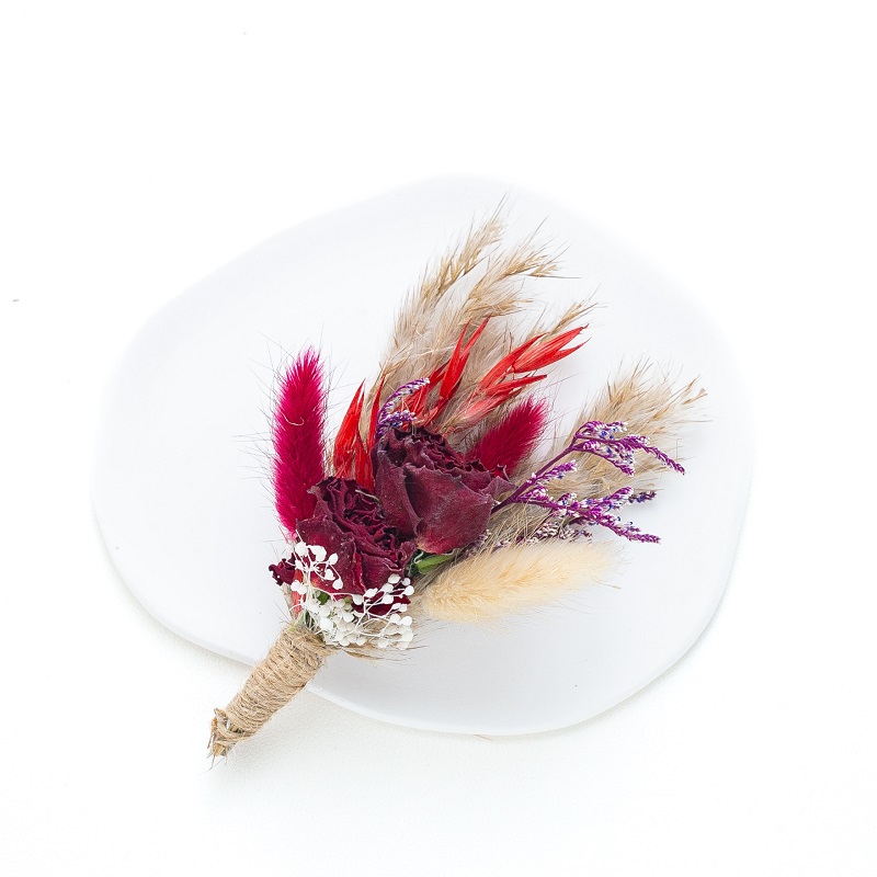dark red bunny tail buttonhole