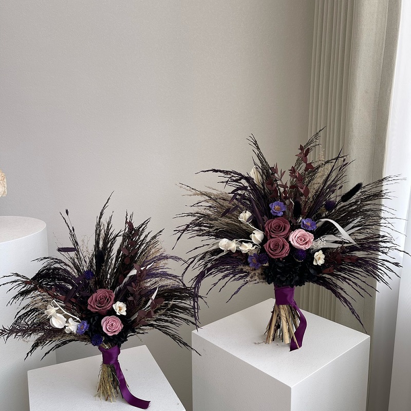 Purple dried roses bridesmaid bouquet